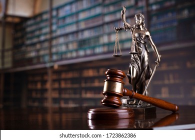 Judge's gavel on library background. Law and justice concept. - Shutterstock ID 1723862386