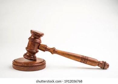 Judge's gavel on light background, top view. Law concept.