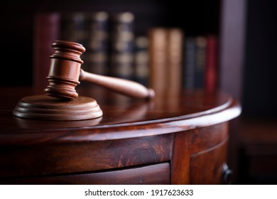 Judges Gavel On Wooden Desk. Law Firm Concept.