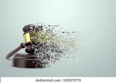 Judge's hammer scatters in the dust on a light background. The concept of corrupt court, unfair trial, helplessness. copy space