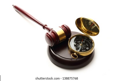 Judge's wooden gavel and compass - Powered by Shutterstock