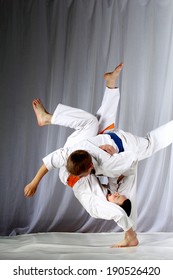 In Judogi Two Athletes Doing Judo Throws