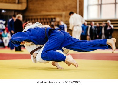judoka wrestlers athletes winning throw ippon in judo competitions