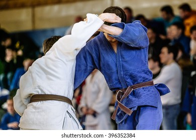 judokas fighters during fight in judo competitions