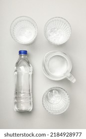 Jug, Bottle And Glasses Of Water, Top View
