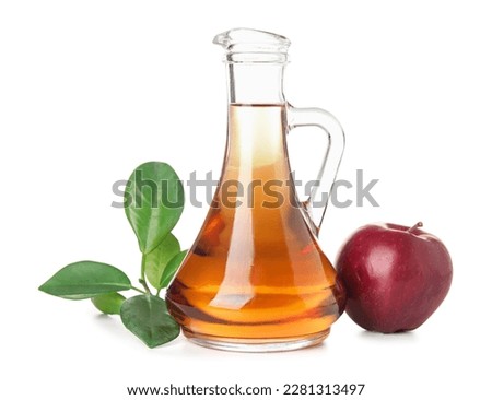 Jug of fresh apple cider vinegar and fruit isolated on white background Stok fotoğraf © 