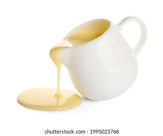 Jug With Sweet Condensed Milk On White Background