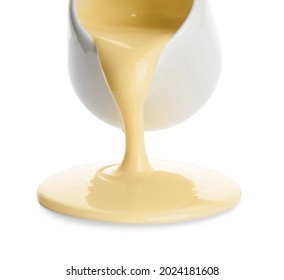 Jug With Sweet Condensed Milk On White Background