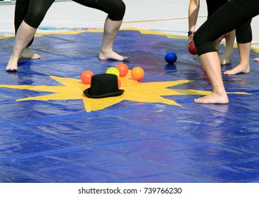 Juggler Team On Blue Carpet With Star, Hat, Balls