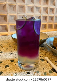 juice from bunga telang or butterfly pea in the restaurant - Shutterstock ID 2259860397