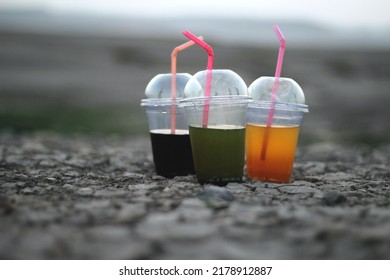 Juice Glasses Placed On Road River Side Summer Photography Shoot Concept