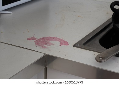 Juice Stain, On White Kitchen Counter. 