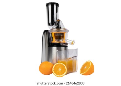 Juicer isolated on a white background. Modern stainless steel fruit and juice machine with orange and juice. Electric fruit and vegetable juicer isolated. 