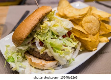 Juicy BLT Burger With Potato Chips.