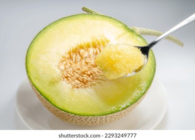 Juicy Crown Musk Melon on white background, Sweet Shizuoka Crown Melon isolated on white background. - Shutterstock ID 2293249777