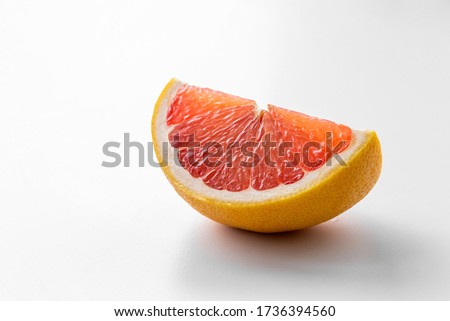 Similar – grinse-Grapefruit