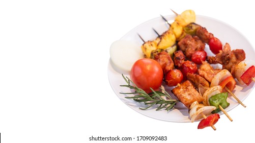 Juicy Delicious BBQ Grilled With Pork ,sausage,tomato,onion,pineapple,chilli Skewers In Plate On Isolated White  Background.