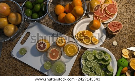 Juicy Delights: Vibrant Citrus Display with Oranges, Grapefruits, and Lemons on Countertop
