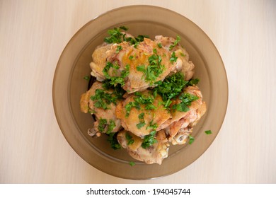 Juicy Fried Chicken Thigh On  Round Plate Top View