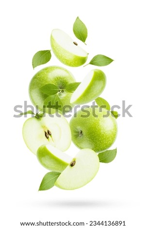 Juicy green apples with green leaves closeup levitation as swirl on white background, whole, half, quarter fruit, isolated, shadow. Summer fruits for advertising, design, label product.