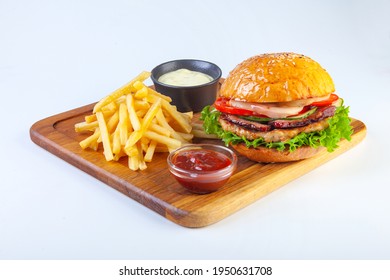 juicy hamburger on a white plate in the studio