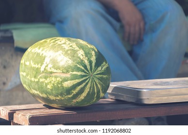 juicy, ripe watermelon on the counter, market trade - Powered by Shutterstock