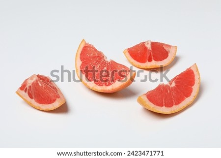 Similar – grinse-Grapefruit