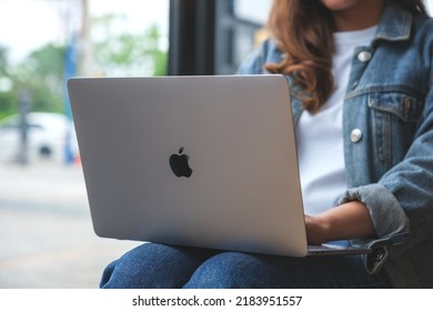 Jul 20th 2022 : A Woman Using And Working On Apple MacBook Pro Laptop Computer, Chiang Mai Thailand