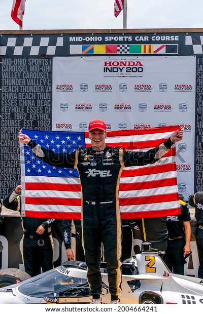 July 04, 2021 - Lexington,\
Ohio, USA: JOSEF NEWGARDEN (2) of the United States wins the Honda\
Indy 200 at Mid-Ohio at the Mid Ohio Sports Car Course in\
Lexington, Ohio.
