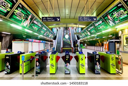 July 13, 2019 - Bangkok, Thailand :: Perspective Of Siam BTS Station With Full Of Green LED Advertising And Billboard Of AIS NEXT G