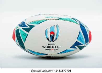July 14, 2019 : Malaysia - Malacca. Close up of a Mini Official Replica Rugby Ball by Gilbert for the Rugby World Cup Japan 2019.  Isolated on white background, promo product shot.