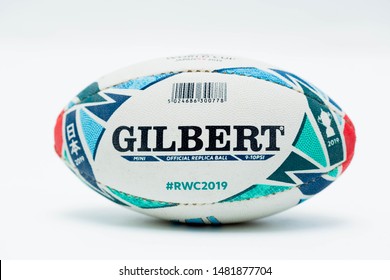 July 14, 2019 : Malaysia - Malacca. Close up of a Mini Official Replica Rugby Ball by Gilbert for the Rugby World Cup Japan 2019.  Isolated on white background, promo product shot.