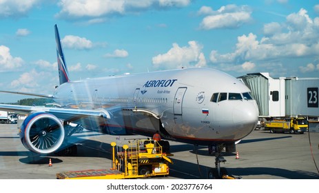 July 15, 2021 Russia, Moscow, Sheremetyevo - Aeroflot Airline Aircraft Waiting For Departure At The Airport Terminal, View Through The Waiting Room Window, Selective Soft  Focus With Place For Text