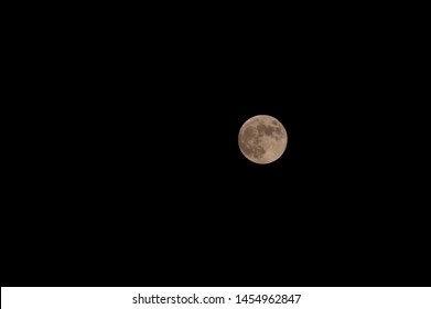 July 16 2019 Before Partical Moon Eclipse. Seen from Turkey. Full moon in black sky. Moon on black isolate background. Full shiny luna and craters of moon.  - Powered by Shutterstock