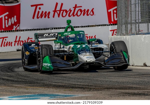 July 16, 2022 - Toronto, ON, CAN: CALLUM LLOTT (77)\
(R) of Cambridge, England travels through the turns during a\
practice for the Honda Indy Toronto at the Streets of Toronto\
Exhibition Place