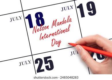 July 18. Hand writing text Nelson Mandela International Day on calendar date. Save the date. Important date. Holiday. Day of the year concept. - Powered by Shutterstock