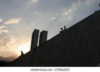 BRASÍLIA/DF/BRAZIL - JULY 19 2008: Details Of The Pantheon Of The Fatherland And Liberty Tancredo Neves In Brasília. Sunset Behind The Pantheon. People Walking Through The Pantheon.