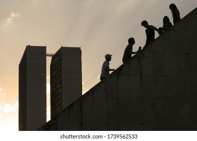 BRASÍLIA/DF/BRAZIL - JULY 19 2008: Details Of The Pantheon Of The Fatherland And Liberty Tancredo Neves In Brasília. Sunset Behind The Pantheon. People Walking Through The Pantheon.