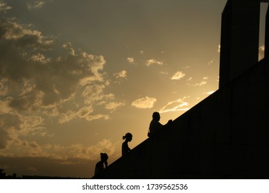 BRASÍLIA/DF/BRAZIL - JULY 19 2008: Details Of The Pantheon Of The Fatherland And Liberty Tancredo Neves In Brasília. Sunset Behind The Pantheon. People Walking Through The Pantheon.