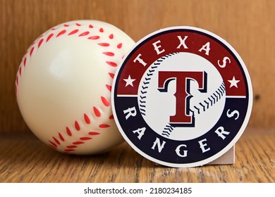 July 19, 2022, Cooperstown, New York. The Emblem Of The Baseball Club Texas Rangers And A Baseball.