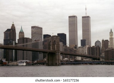 JULY 1995 - NEW YORK: The Skyline Of Manhattan With The Twin Towers Of The World Trade Center And The Brooklyn Bridge, Manhattan, New York.