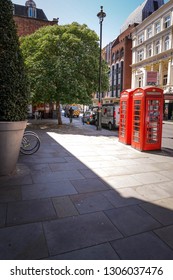 July 2018, St. Martins Lane, London, England. British Red Phone Box.