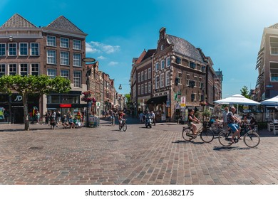 July 2021, Center Of Zwolle A Place In The Netherlands. People Walk And Cycle Past. 