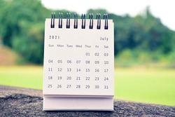 July 2021 White Calendar With Green Blurred Background. 2021 New Year Concept