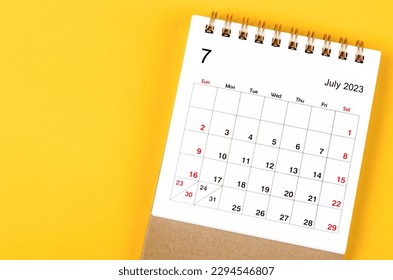 July 2023 Monthly desk calendar for 2023 year on yellow background. - Shutterstock ID 2294546807