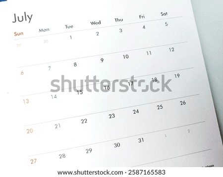 July 2025. Resolution, strategy, solution, goal, business and holidays. Date - month. Page of annual monthly Calendar. Plan Your Month with Holidays, Events, and Important Dates. Close up calendar
