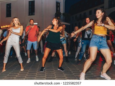July 21, 2018 , Minsk,Belarus Street walks A group of people dancing on a square in front of a group of people - Shutterstock ID 1225582357