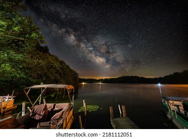 July 21st 2022 - Logan Ohio - United States.  Boats Moored Along A Dock With The Night Sky Behind At Lake Logan Ohio. 