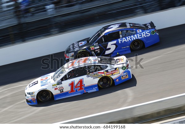July 23, 2017 - Speedway, IN, USA: Clint Bowyer (14)\
and Kasey Kahne (5) battle for position during the Brantley Gilbert\
Big Machine Brickyard 400 at Indianapolis Motor Speedway in\
Speedway, IN.