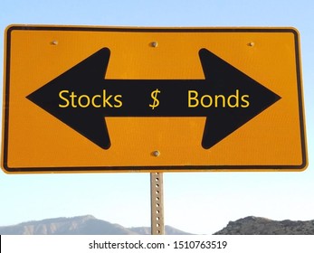 July 25, 2019 Acton, California USA - Stocks Vs Bonds Arrow Direction Sign In Yellow And Black
